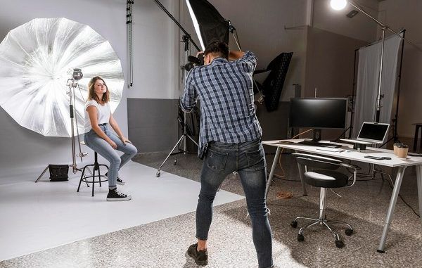 Long shot man taking photos of beautiful model. top 3 Best Photography Studios in Mexico City