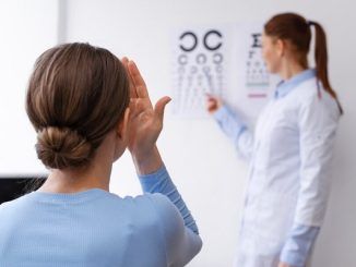 Doctor testing patient eyesight