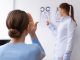 Doctor testing patient eyesight