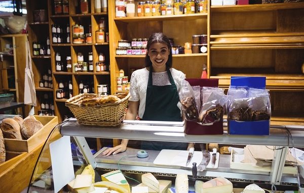 Female staff standing at cheese counter. top 3 best cheese shops in Mexico City