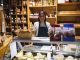 Female staff standing at cheese counter. top 3 best cheese shops in Mexico City
