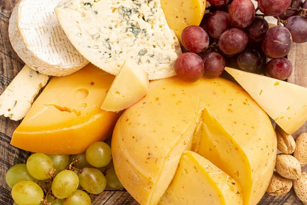 Close up rustic cheese grapes 