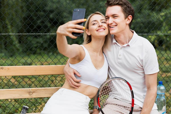 Young couple taking selfie