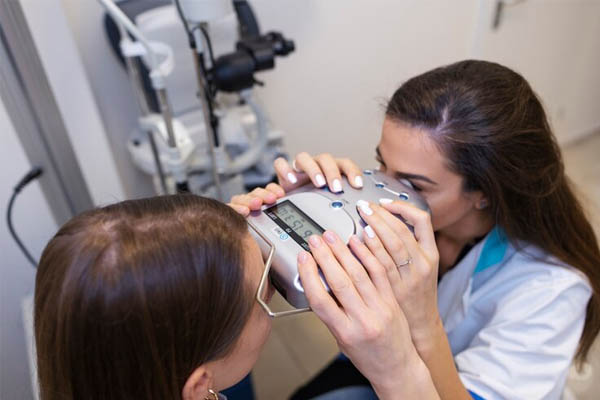 Doctor testing patient eyesight
