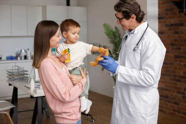 young mother toddler pediatrician