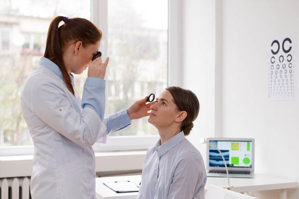 Doctor testing patient eyesight 